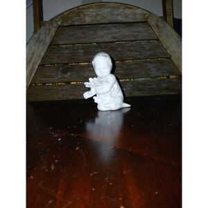 Bing & Grondahl Denmark

White Figurine Of Mermaid

Boy Playing With Seaweed